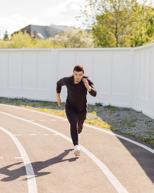 Male athlete doing fitness training. Workout outside the gym.