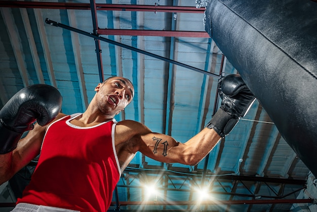 Male boxer practising