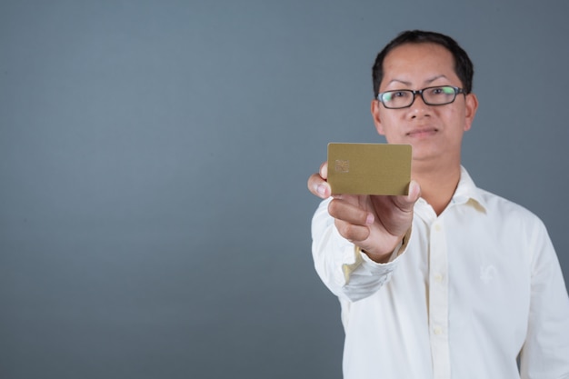 Free photo male businessmen holding banknotes, cash making gestures with sign language