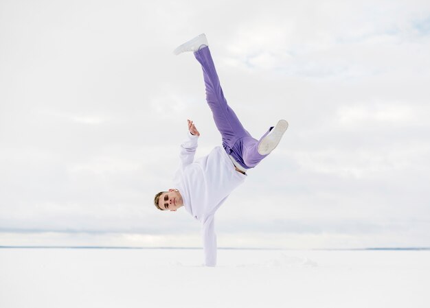 Male dancer posing outside