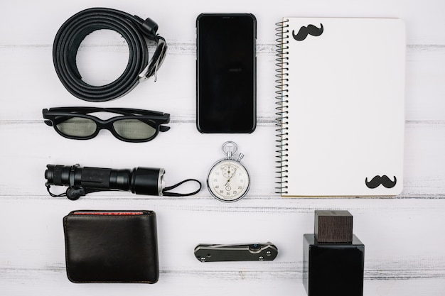 Male devices and accessories on desk