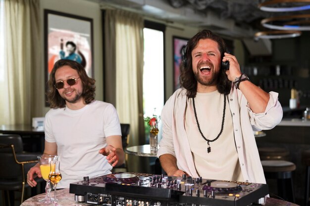 Male dj at the party in charge of the music entertainment