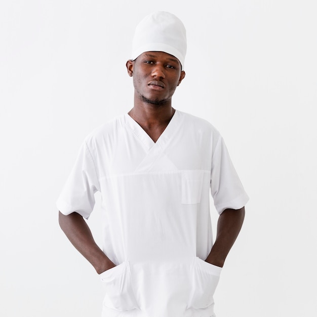 male doctor having his hands in pockets