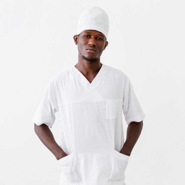 male doctor having his hands in pockets