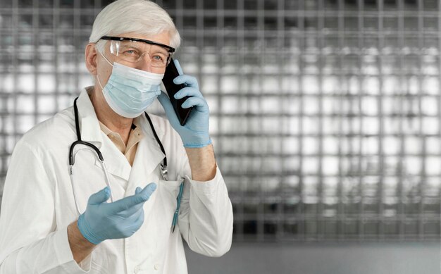 Male doctor portrait with medical mask