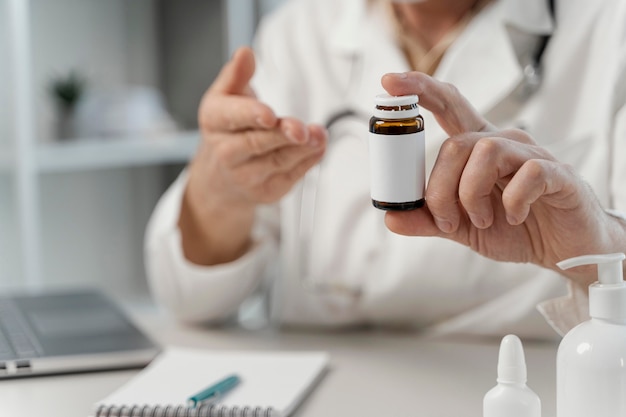 Male doctor prescribing pills to patient