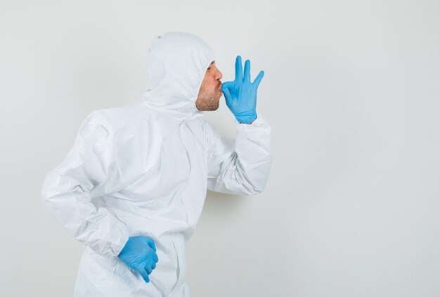 Male doctor in protective suit