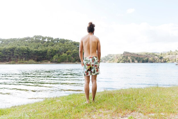 Male enjoying lake view