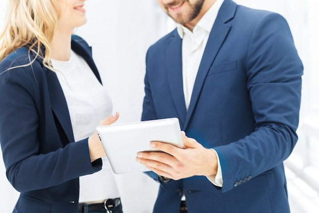 Male and female office workers.