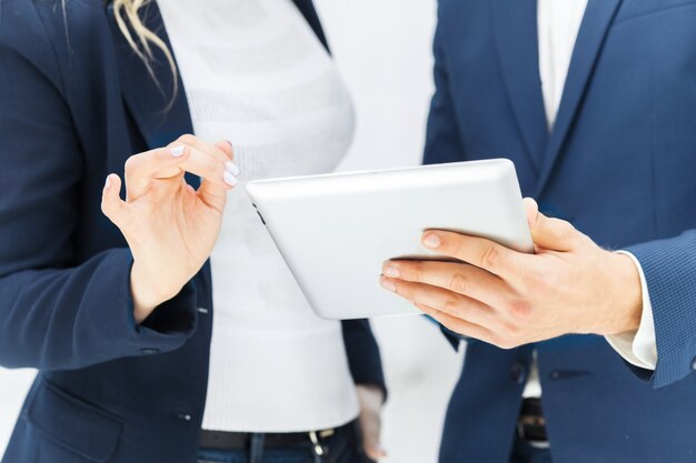 Male and female office workers.