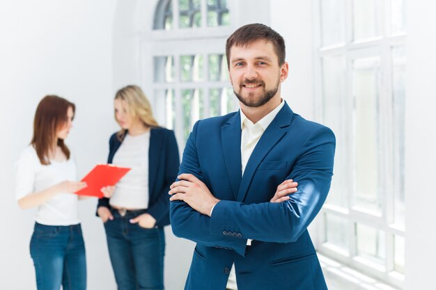 Male and female office workers.