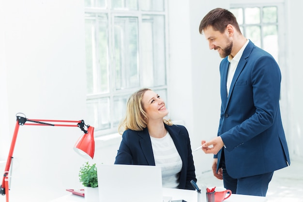 Free photo male and female office workers.