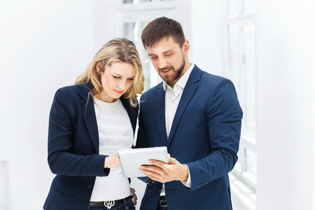 Male and female office workers.