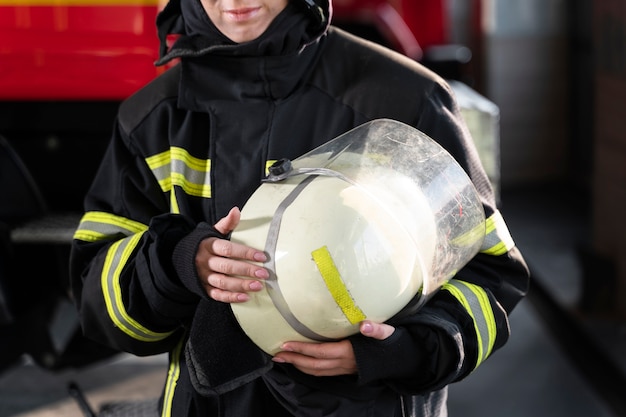 Free photo male firefighter at the station