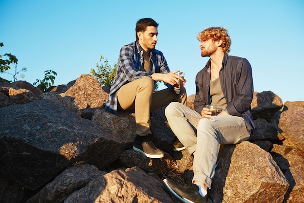 Free photo male friends chatting with each other