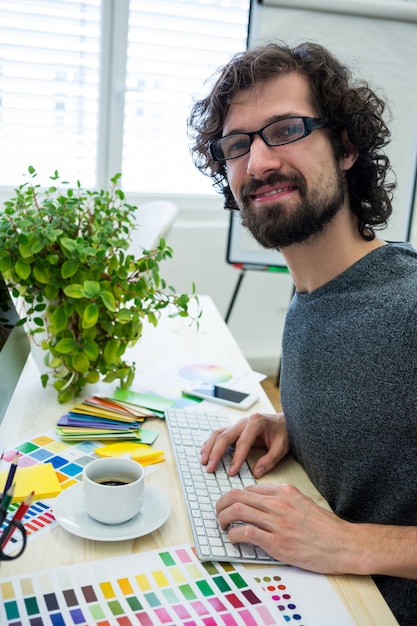 Male graphic designer using computer