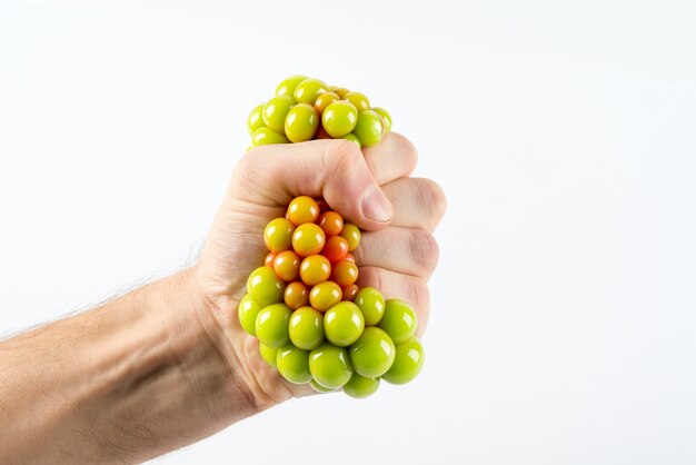 Male hand squeezing stress ball