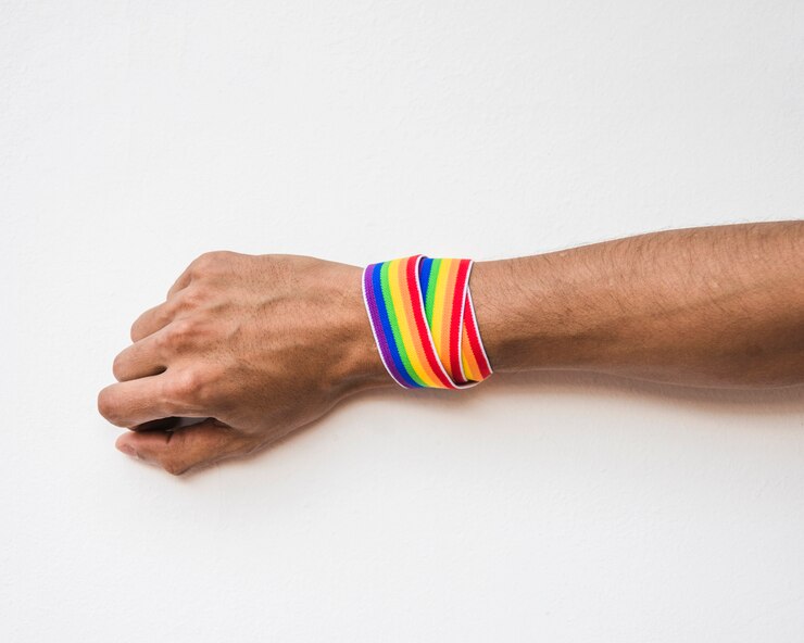 Free Photo male hand with band in lgbt colors