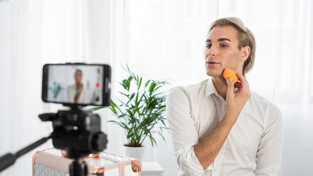 Free photo male make-up look being filmed