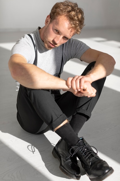 Male model sitting on the floor