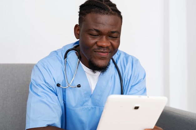 Free photo male nurse working at the clinic