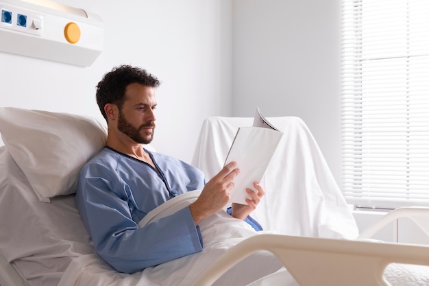 Male patient in bed at the hospital