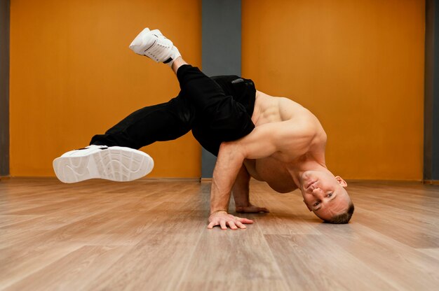 Male performing breakdance