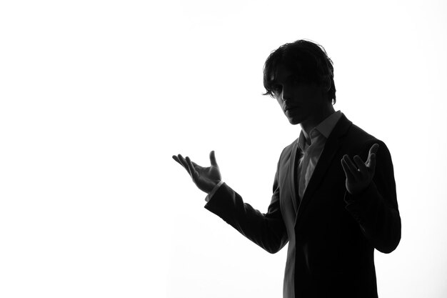 Male person silhouette in suit shadow white background young