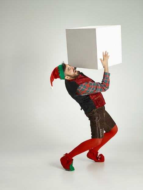 Male person with an elf costume.