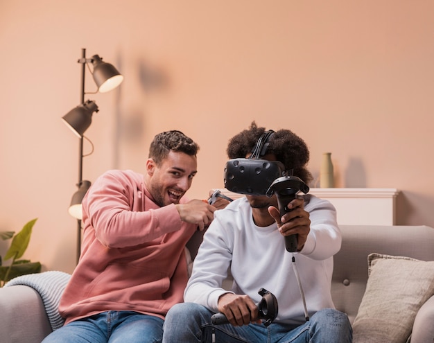 Male playing with virtual headset