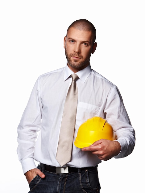 Free photo male in a suit with hard hat isolated on white