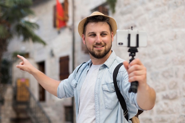 Free photo male traveler in montenegro outdoors