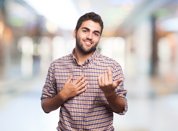 Male with a beckoning gesture