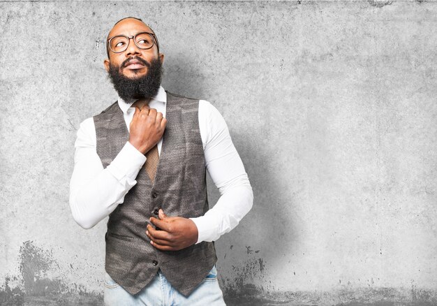 Man adjusting his tie