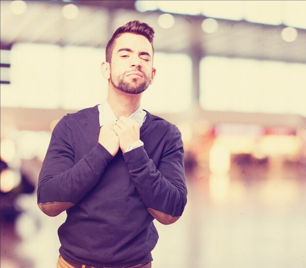 Man adjusting shirt