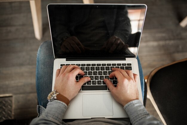 man adult young online laptop