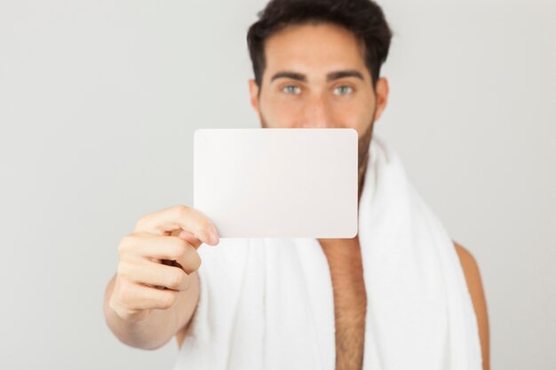 Man after bath with blurred background
