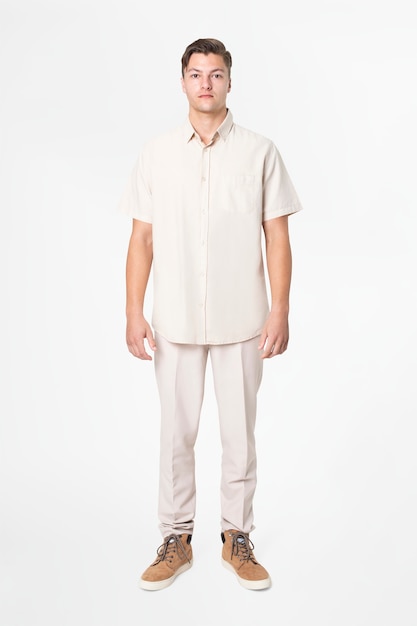 Man in beige shirt and pants casual wear fashion full body