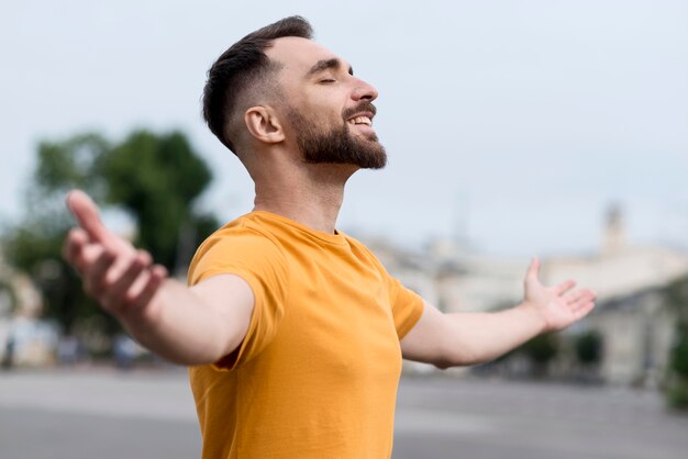 Man being happy for being outdoors