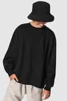 Free photo man in black sweater and black bucket hat youth apparel shoot