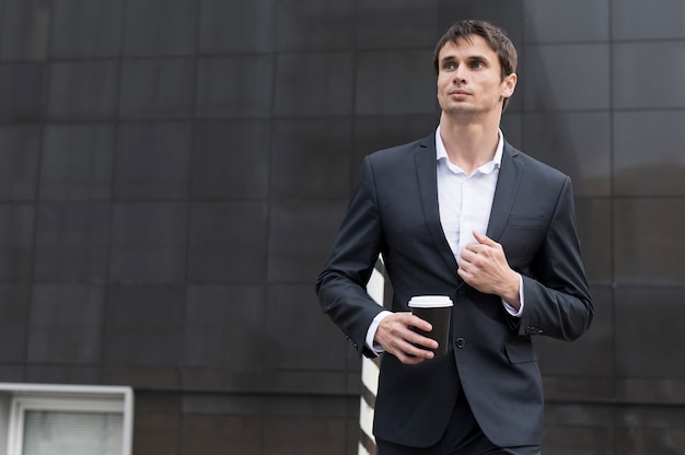 Man on break drinking a coffee