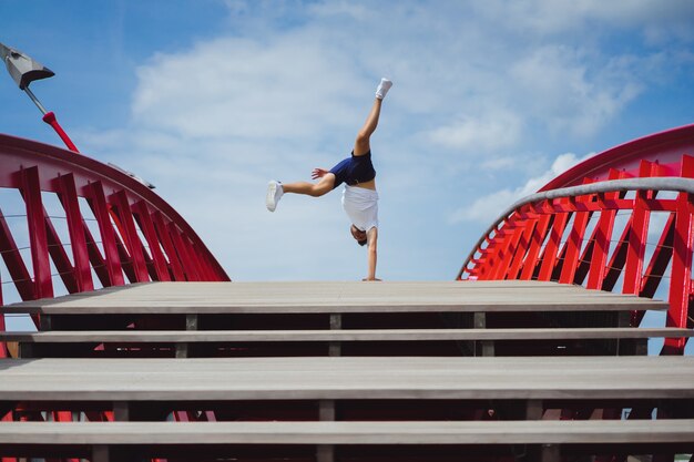 man on the bridge. handstand breakdance