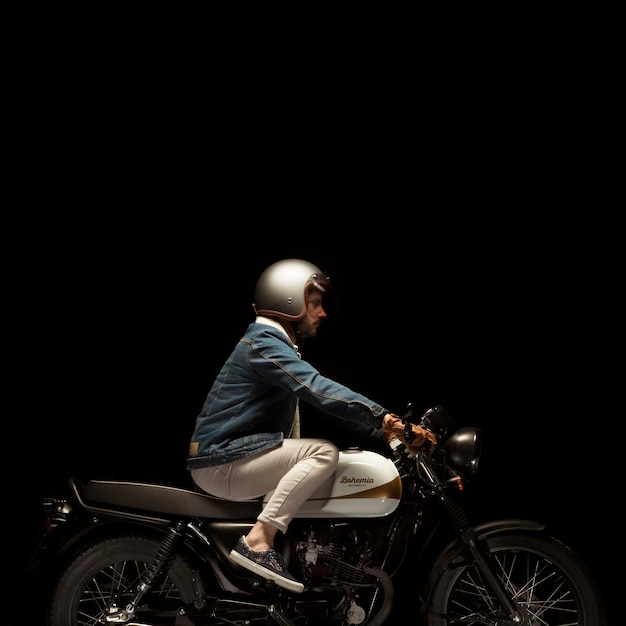 Free photo man on cafe racer style motorbike