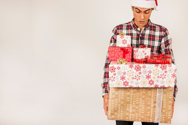 Man carrying many presents