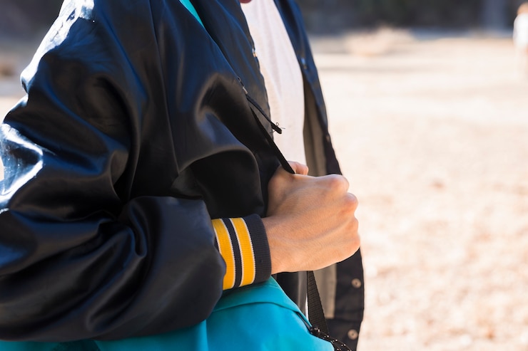 Free Photo man in casual jacket standing outside
