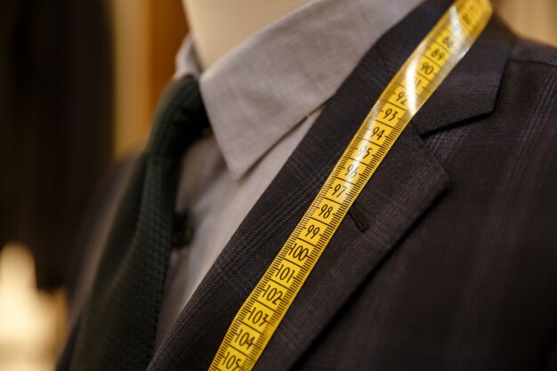 Man checking the measures of his suit