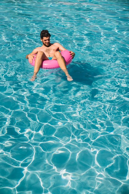 Man chilling in pool