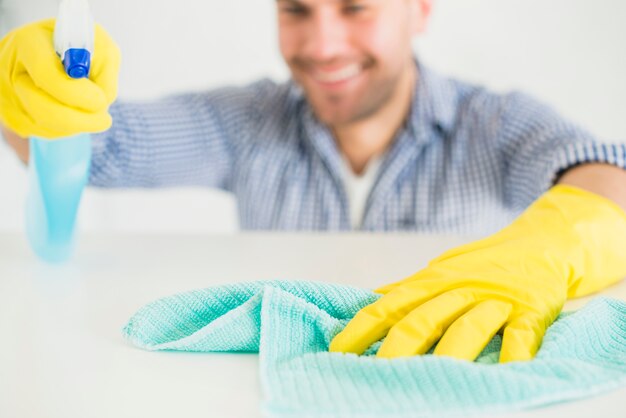 Man cleaning his home