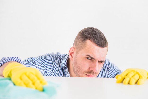 Man cleaning his home