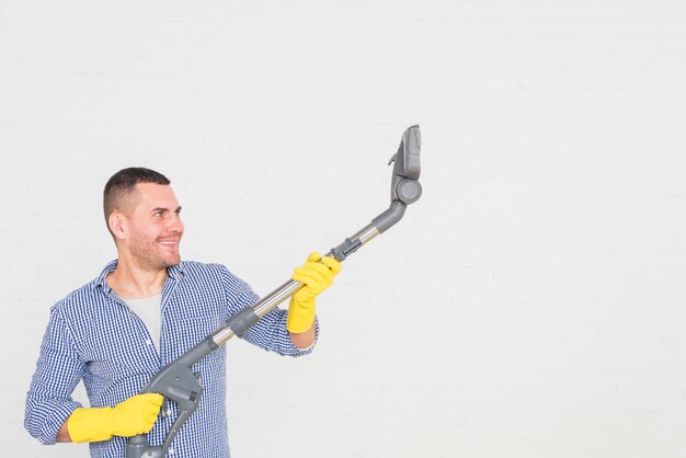 man cleaning his home